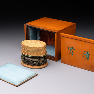 An oval Chinese imperial gold and silver filigree lidded 'dragon' box on reticulated stand and with presentation box, Qianlong mark and of the period