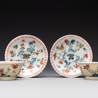 A pair of Chinese famille verte cafe-au-lait-ground cups and saucers, Kangxi