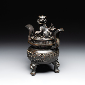 A Chinese bronze censer and cover with a Buddhist lion, Ming