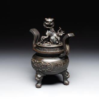 A large Chinese bronze censer and cover with a Buddhist lion, Ming