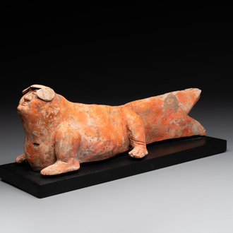 A Chinese Mingqi terracotta amphibian-shaped grave guardian with human head, Western Han