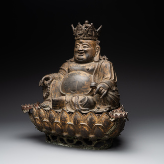 An important and large Chinese gilt bronze Buddha on a lotus throne, Ming