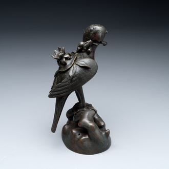 A rare Chinese bronze 'parrot' incense burner, Ming