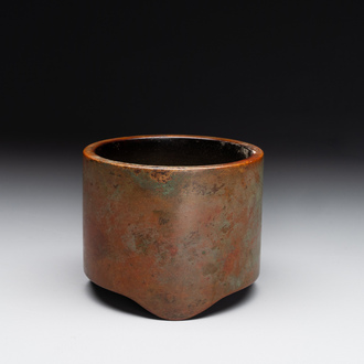 A small Chinese bronze cylindric tripod censer, Xuande mark, Ming