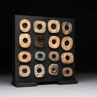 A collection of 16 Chinese neolithic jade 'bi' discs, probably Shang
