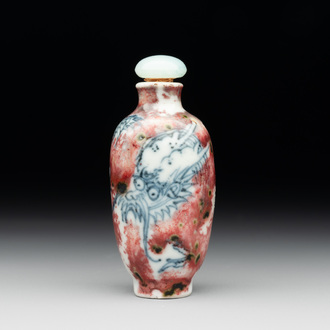 A Chinese blue, white and copper-red 'dragon' snuff bottle, Chenghua mark, 18th C.
