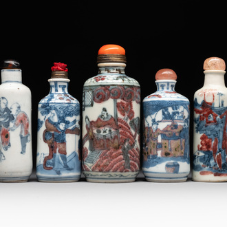 Five Chinese blue, white and copper-red snuff bottles, 19/20th C.