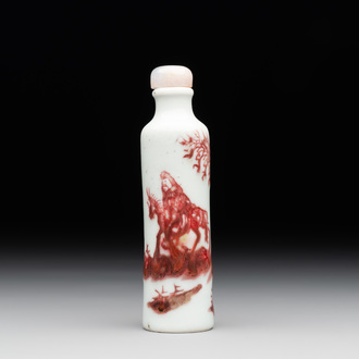 A Chinese copper-red snuff bottle with travellers in a landscape, Qianlong mark, 19th C.