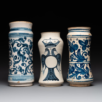 Three large blue and white pottery albarelli, Spain, 17th C.