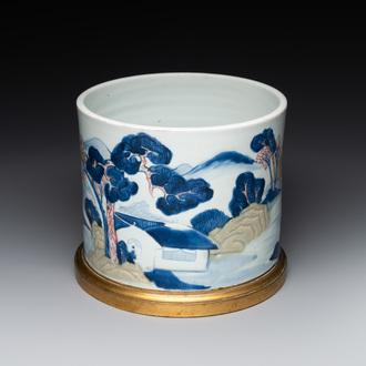 A large Chinese blue, white, celadon and copper-red brush pot on a later gilt bronze foot, 'bitong', Kangxi