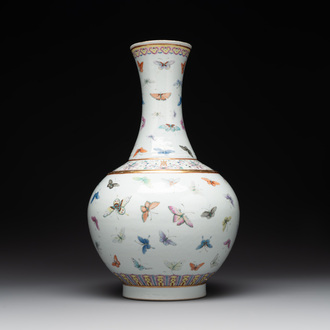 A Chinese famille rose 'butterfly' bottle vase, Guangxu mark and of the period