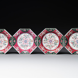 Four octagonal Chinese famille rose ruby-ground plates with floral design, Yongzheng