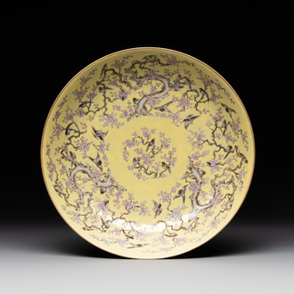 A Chinese yellow-ground famille rose 'magpie and plum tree' plate, Tongzhi mark and of the period