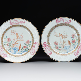 A pair of Chinese famille rose 'magpie and peony' plates with bianco-sopra-bianco rims, Yongzheng