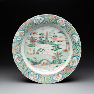 A Chinese famille verte 'river landscape' dish, artemisia leaf mark, Kangxi