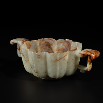 A Chinese celadon and russet jade wedding cup, 18th C.