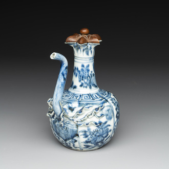 A fine Chinese blue and white 'pomegranate' kendi and a wooden cover, Wanli