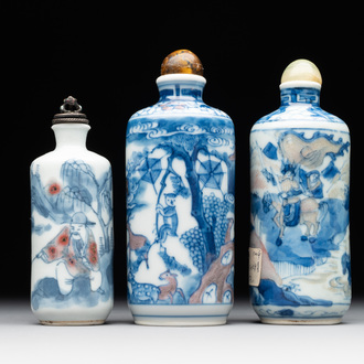 Three Chinese blue, white and copper-red snuff bottles, Yongzheng mark, 19/20th C.