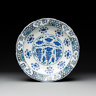 A polychrome Iznik 'grape' dish, Turkey, ca. 1570