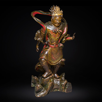 A large Japanese polychromed and gilt-lacquered wood figure of a divine general, Edo, dated 1623