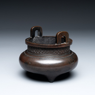 A Chinese bronze two-handled tripod censer, Ding 鼎 mark, Yuan/Ming