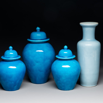 Three Chinese turquoise-glazed covered vases and a lavender-blue-glazed vase, Kangxi mark, 19/20th C.