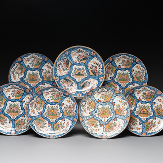 Seven Dutch Delft polychrome 'flower basket' plates, 18th C.