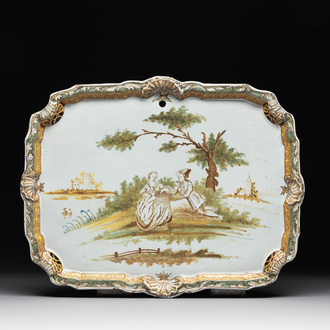 A polychrome Dutch Delft 'pastoral subject' plaque, 18th C.