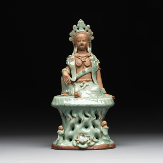 A Chinese Longquan celadon Guanyin, Ming or later