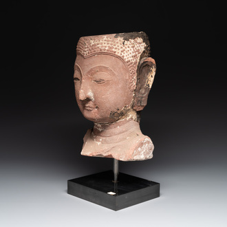 A red sandstone head of Buddha, Thailand, possibly Ayutthaya period, 15th C.