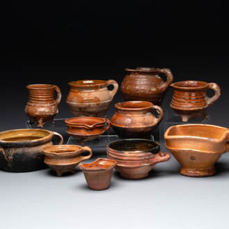 11 brown-glazed pottery wares, Low Countries, 14/17th C.