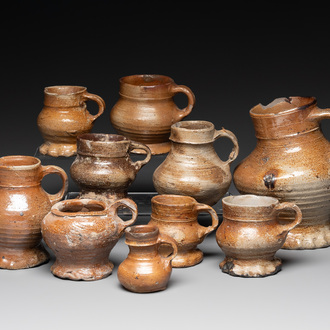 A collection of 10 German stoneware mugs, 14/16th C.