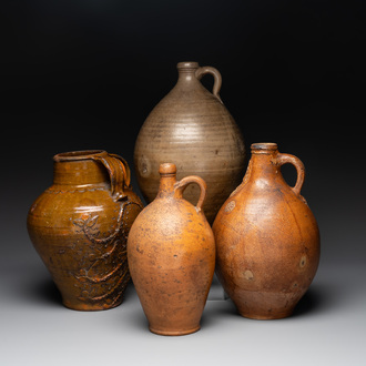 Three German stoneware jugs, including a bellarmine, and a French or English pottery jug, 17th C. and later
