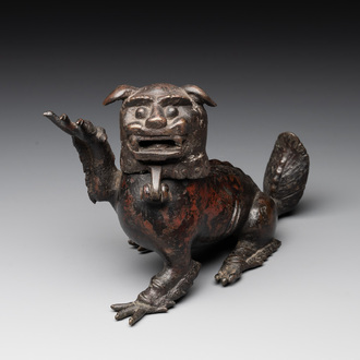 A rare Chinese bronze lion-form incense burner and cover, Song/Ming