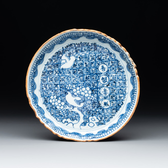 A Chinese blue and white shonzui ko-sometsuke dish with birds and calligraphy for the Japanese market, Fu 福 mark, Ming, 17th C.