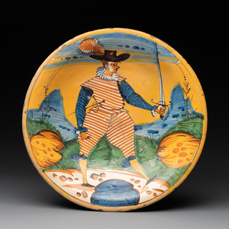 An Italian maiolica dish with a swordsman, Montelupo, early 17th C.