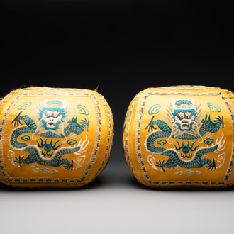 A pair of Chinese yellow-ground embroidered silk 'dragon' cushions, 19th C.