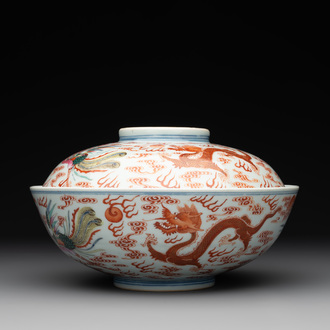 A Chinese famille rose 'dragon and phoenix' bowl and cover, Jiaqing mark and of the period