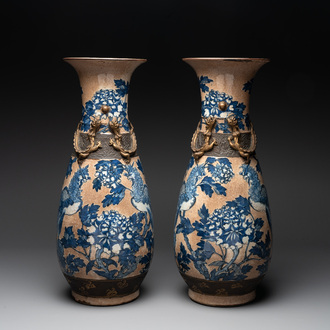 A pair of Chinese Nanking blue and white crackle-glazed 'phoenix' vases, 19th C.