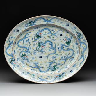 An oval Chinese Canton famille verte 'nine dragons' dish, 19th C.