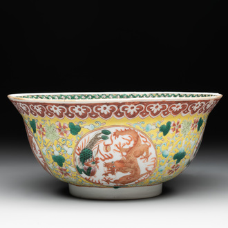 A Chinese famille rose yellow-ground 'dragon and phoenix' bowl, artemisia leaf mark, Guangxu