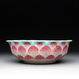 A Chinese famille rose 'lotus' bowl with turtle-shaped flower holder, Qianlong mark and of the period