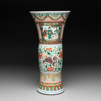 A Chinese wucai 'gu' vase with Buddhist lions, peony scrolls and figures, 19th C.