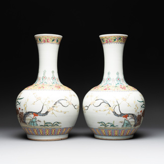 A pair of Chinese famille rose bottle vases with flowers, Qianlong mark, Republic