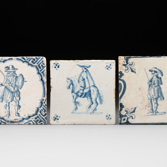 Three fine blue and white Dutch Delft 'soldier' tiles, 17th C.