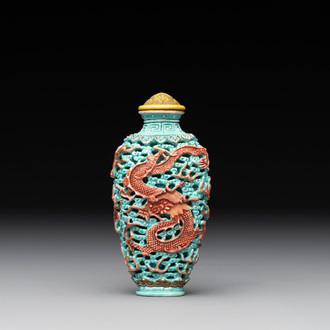 A Chinese moulded turquoise-ground famille rose 'dragon and phoenix' snuff bottle, 19th C.