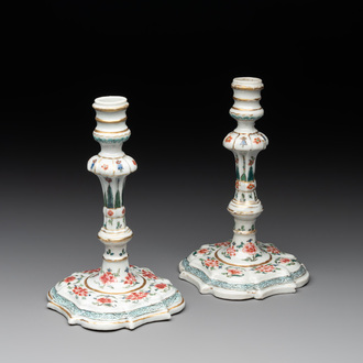 A pair of rare Chinese export famille rose candlesticks with floral design, Yongzheng/Qianlong