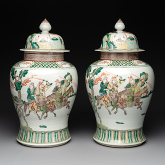 A pair of famille verte-style 'warriors on horseback' vases and covers, Samson, Paris, 19th C.
