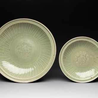 A Chinese Longquan celadon dish and a plate with floral design, Ming