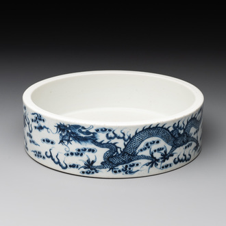 A Chinese blue and white 'dragon and phoenix' brush washer, Yongzheng mark, 19th C.